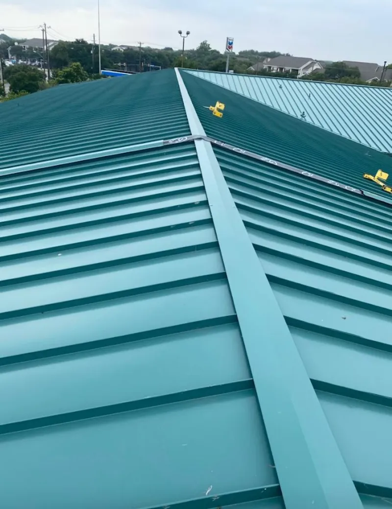 Green commercial metal roof ridge and valley for Metal Roof Repair in Oldsmar